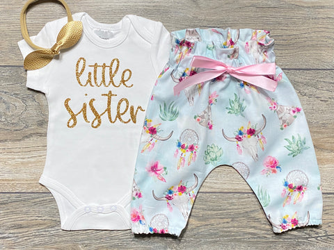 Image of Newborn / Coming Home Outfit Little Sister - Take Home Outfit Gold Glitter Little Sister Bodysuit + Boho Bull Skull Pants + Gold Bow Girls